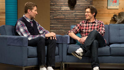 Andy Samberg Wears a Plaid Shirt & Glasses Summary