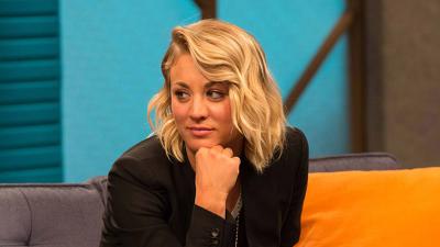 Kaley Cuoco Wears a Black Blazer and Slip-on Sneakers Summary