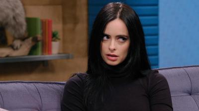 Krysten Ritter Wears a Turtleneck and Black Boots Summary